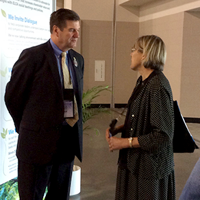 Jeff Thiemann, Portico’s president and CEO, speaking with Barbara Rossing, a Lutherans Restoring Creation board member.